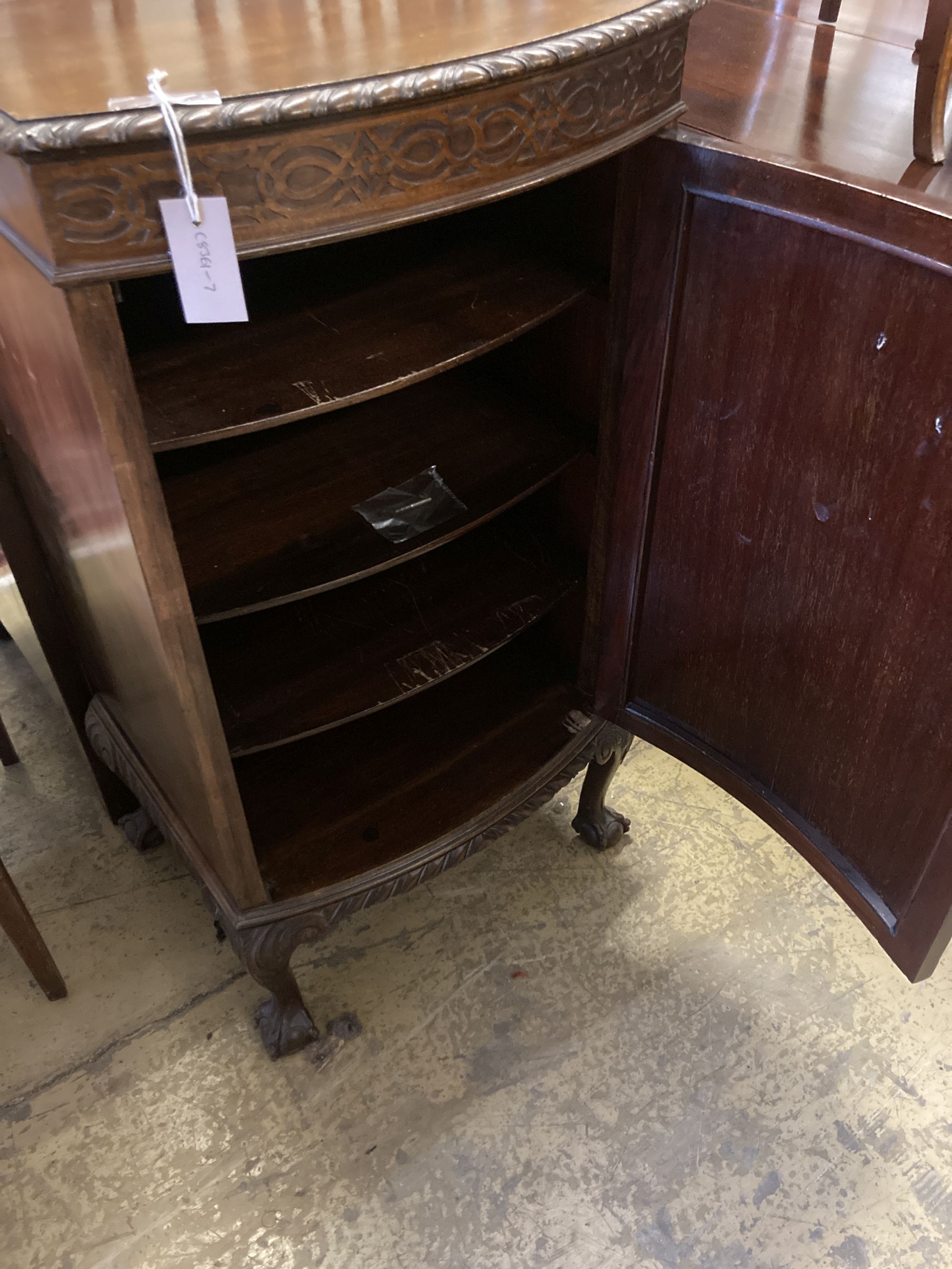 A 1920s Chippendale revival mahogany bowfront pier cabinet, width 50cm, depth 44cm, height 96cm